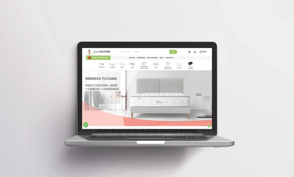 Web de ALS Colchonerías en un portátil con el banner «Renueva tu cama» y una cama con cabecero