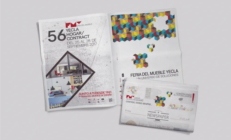 Fair poster alongside a colourful geometric pattern and a promotional newspaper