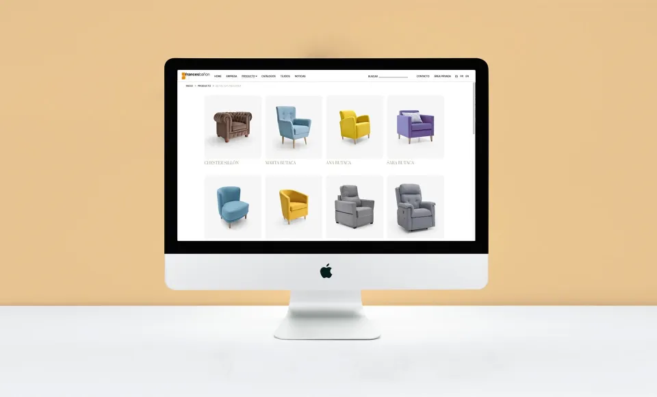 Web de Francés Bañón en un iMac con la rejilla de sillones de distintos colores