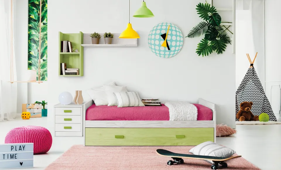 Children's room with a white-and-green bed, shelving and a teepee tent