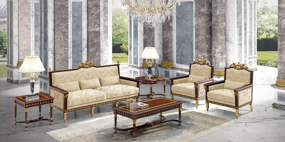 Classical hall between marble columns with Koher's beige-upholstered sofas and armchairs