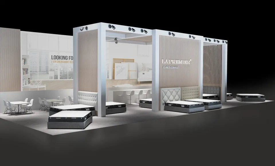 Render del stand de feria con los paneles «Looking for» y «La Premier» y colchones sobre plintos