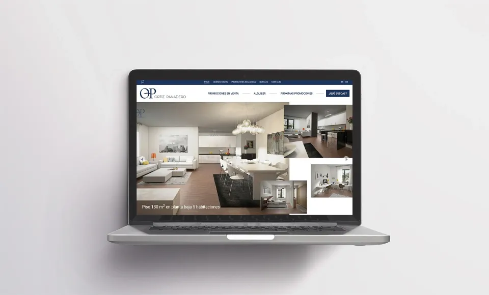 Ortiz Panadero property website on a laptop with interior photos of a home for sale