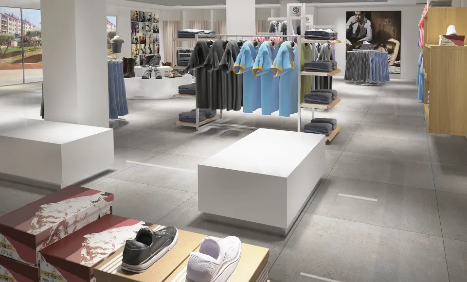 Render 3D de una tienda de ropa con camisas y calzado sobre mesas blancas