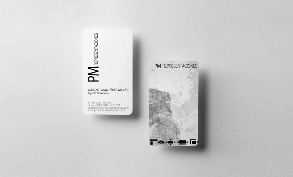 PM Representaciones business cards showing the contact details