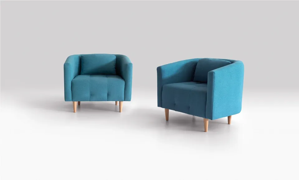 Two petrol-blue upholstered tub chairs on wooden legs, shown in two shots