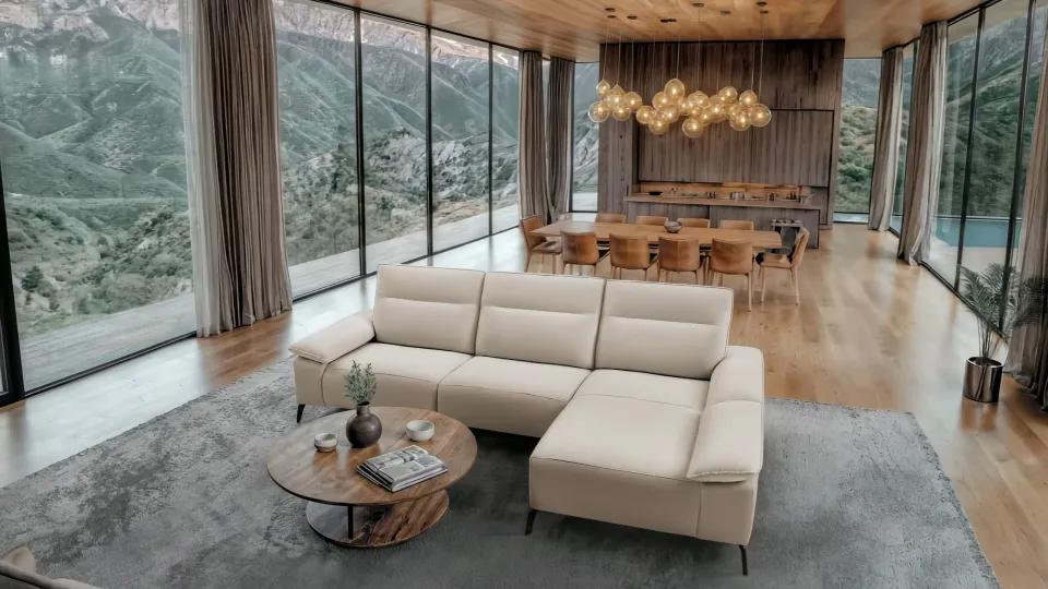 Vídeo creado a partir de una sola imagen: sofá chaise longue beige en un salón con vistas a la montaña.