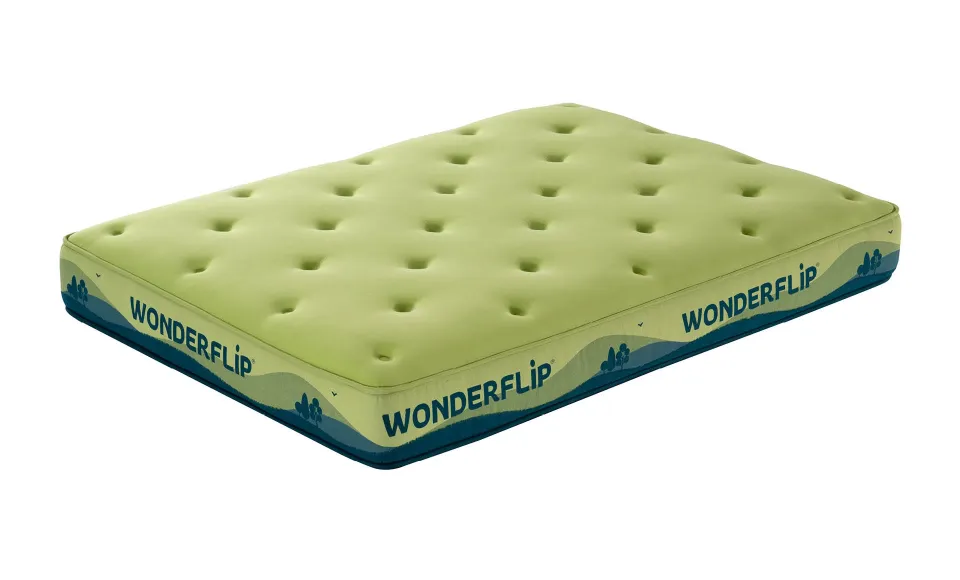 Green tufted mattress with the Wonderflip logo, on a white background